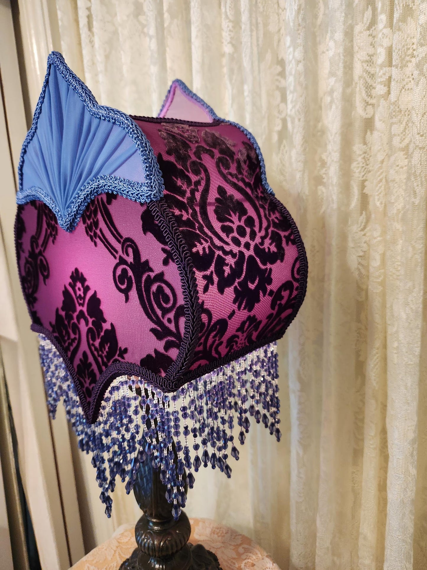 Vintage style purple and country, blue lamp and shade.