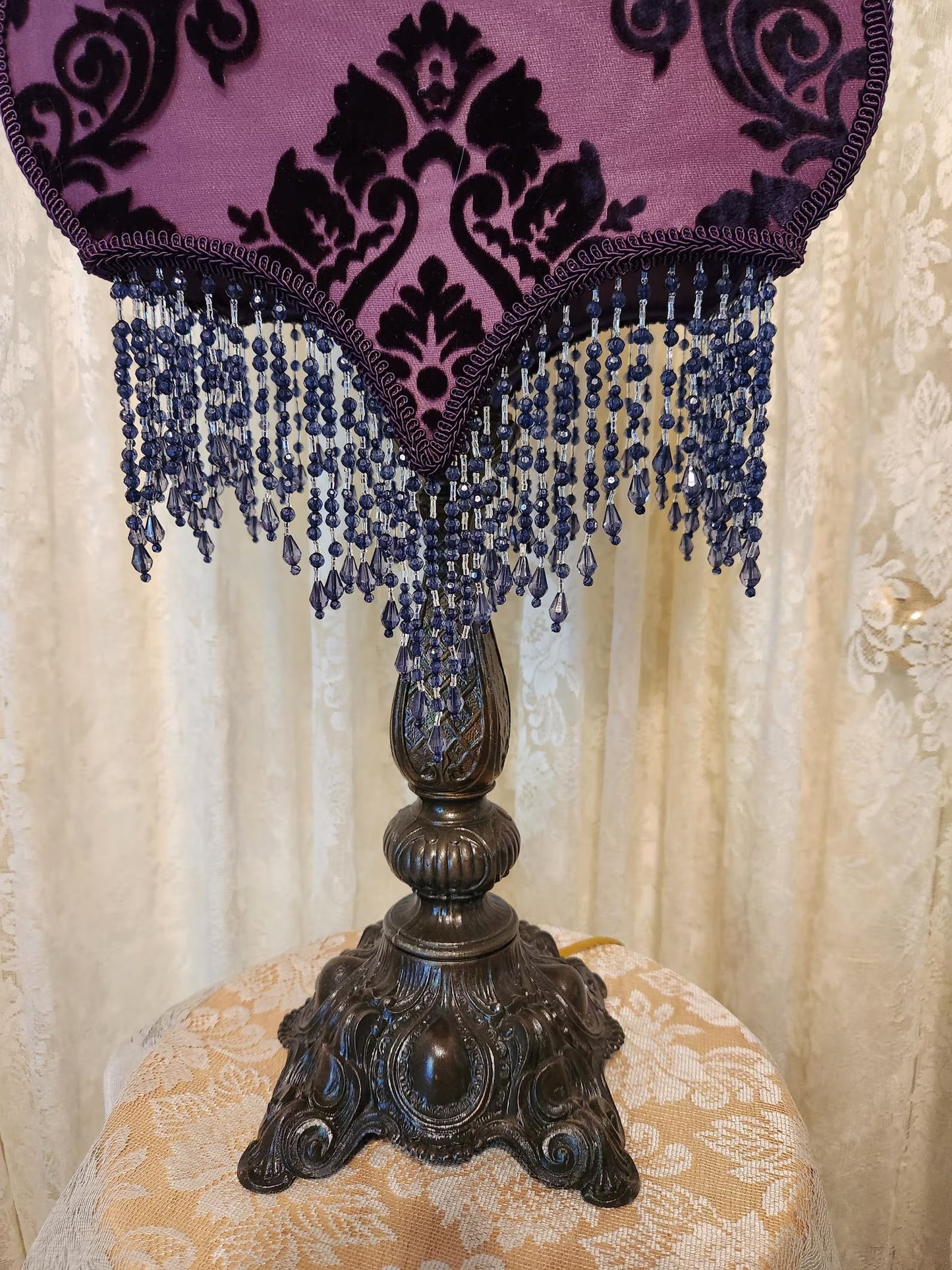 Vintage style purple and country, blue lamp and shade.