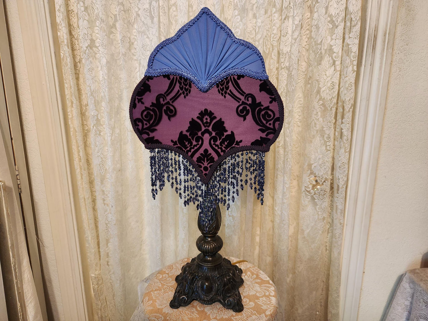 Vintage style purple and country, blue lamp and shade.