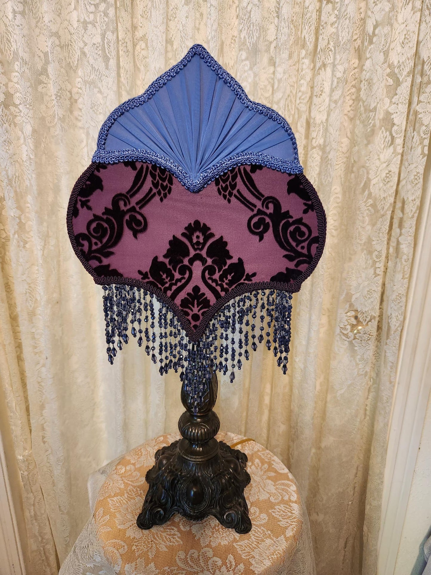 Vintage style purple and country, blue lamp and shade.